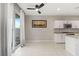 Bright kitchen with white cabinets, stainless steel appliances, and tile flooring at 356 Free Fall Ave, North Las Vegas, NV 89084