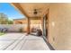 Outdoor back patio providing shade, ceiling fan, and a great space for entertaining at 3645 Bella Legato Ave, North Las Vegas, NV 89081