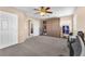 Large room showcasing ample storage with a built-in cabinet and a view into another bedroom at 3645 Bella Legato Ave, North Las Vegas, NV 89081