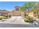 Charming two-story home featuring a well-manicured front yard and a spacious two-car garage at 3645 Bella Legato Ave, North Las Vegas, NV 89081