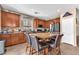 Eat-in kitchen featuring a central island with a marble top and stainless steel appliances at 3645 Bella Legato Ave, North Las Vegas, NV 89081