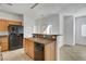 Kitchen featuring stainless appliances, granite countertop, and breakfast bar at 4020 Smokey Fog Ave # 201, North Las Vegas, NV 89081