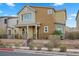 Lovely two-story home featuring manicured landscaping and a welcoming facade at 408 Gracious Way, Henderson, NV 89011