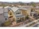 Charming two-story home with inviting porch and landscaped front yard with secure fencing at 408 Gracious Way, Henderson, NV 89011