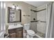 Beautiful bathroom features a dark wood vanity and a step-in shower at 4516 Whelk Pl, North Las Vegas, NV 89031