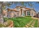 Beautiful single-story home featuring lush green lawn and an inviting entrance at 4516 Whelk Pl, North Las Vegas, NV 89031