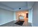 Inviting living room leading to the kitchen with modern lighting fixtures at 4525 Dean Martin Dr # 503, Las Vegas, NV 89103