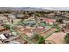 Aerial view of the property with solar panels, a bocce court, and mature trees at 4625 W Robindale Rd, Las Vegas, NV 89139