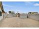 Large backyard featuring a storage shed and a block fence, creating a private outdoor space at 4625 W Robindale Rd, Las Vegas, NV 89139