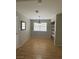 This dining room features a tile floor, built-in shelving, and a light fixture at 4625 W Robindale Rd, Las Vegas, NV 89139