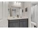 Clean bathroom showcasing a double vanity, ample lighting, and neutral decor at 4733 Cactus Sun Ln, North Las Vegas, NV 89031