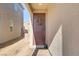 Inviting front entrance with a decorative wreath on a bold-colored door at 4733 Cactus Sun Ln, North Las Vegas, NV 89031