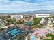 Overhead shot of 5209 Rim View near Los Prados golf course, a pool, and parking area at 5209 Rim View Ln, Las Vegas, NV 89130