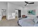 Bright bedroom featuring ensuite bathroom, barn door and modern decor at 5209 Rim View Ln, Las Vegas, NV 89130