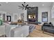 Spacious living room featuring a modern fireplace and open-concept design at 5209 Rim View Ln, Las Vegas, NV 89130