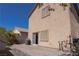 Backyard patio with mature landscaping and privacy fence at 53 Hoke Edward Ct, North Las Vegas, NV 89031