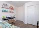 Bedroom featuring wood floors, closet with sliding doors and a piano at 53 Hoke Edward Ct, North Las Vegas, NV 89031