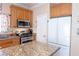 Kitchen featuring tile floor, stainless appliances, granite countertops and an island at 53 Hoke Edward Ct, North Las Vegas, NV 89031