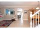 A living space that showcases an open layout connecting the living room, dining area, and a glimpse of the Gathering room at 53 Hoke Edward Ct, North Las Vegas, NV 89031