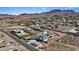 Expansive aerial view showcasing the home's backyard and neighborhood views at 541 Patti Ann Woods Dr, Henderson, NV 89002