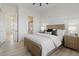 Bedroom with neutral tones, ceiling fan, and natural light to create a calming space at 541 Patti Ann Woods Dr, Henderson, NV 89002