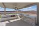 Stylish outdoor kitchen with stone accents, built-in grill, sink, and ample counter space at 541 Patti Ann Woods Dr, Henderson, NV 89002