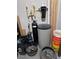 Garage showing water softener with other miscellaneous items at 5528 Eleganza Ave, Pahrump, NV 89061