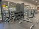 Well-equipped community gym with dumbbells, weights, and exercise machines at 5528 Eleganza Ave, Pahrump, NV 89061