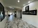 Hallway entrance with marble floors and modern design, leading to various amenities at 5528 Eleganza Ave, Pahrump, NV 89061