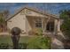 Inviting single-story home displaying desert landscaping, a covered entry, and a charming, well-maintained facade at 5989 Sierra Medina Ave, Las Vegas, NV 89139