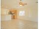 Living area with an open concept design, ceiling fan, and bright light at 5989 Sierra Medina Ave, Las Vegas, NV 89139