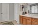 A clean and modern bathroom featuring a single sink vanity and a shower at 6156 Twilight Cove Cir, Las Vegas, NV 89131