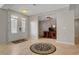 Welcoming entryway leading to a home office, featuring tile flooring and a bright, airy feel at 6156 Twilight Cove Cir, Las Vegas, NV 89131