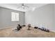 Carpeted fitness room with workout equipment and neutral walls at 6156 Twilight Cove Cir, Las Vegas, NV 89131