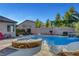 A sparkling pool and spa offer a refreshing escape in a private backyard with mature landscaping at 6156 Twilight Cove Cir, Las Vegas, NV 89131