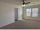 Bedroom featuring neutral tones, natural light, and carpeted floors at 6425 W Haleh Ave, Las Vegas, NV 89141