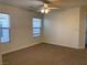 Bedroom with carpet floors, natural light, and neutral wall color at 6425 W Haleh Ave, Las Vegas, NV 89141