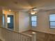 Upstairs bonus room with carpet, a ceiling fan, and natural light at 6425 W Haleh Ave, Las Vegas, NV 89141