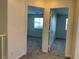 Hallway with two doorways leading to bedrooms at 6425 W Haleh Ave, Las Vegas, NV 89141