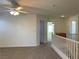 Second-floor living area with natural lighting and ceiling fan at 6425 W Haleh Ave, Las Vegas, NV 89141