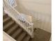 Carpeted staircase featuring white handrails at 6425 W Haleh Ave, Las Vegas, NV 89141