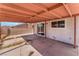 Covered patio featuring a concrete slab, views of the backyard and entry into the property at 6731 Fallona Ave, Las Vegas, NV 89156