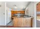 Functional kitchen with breakfast bar and white appliances at 6731 Fallona Ave, Las Vegas, NV 89156