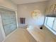 Bathroom featuring soaking tub with jets, tiled shower, and serene ambiance at 720 Florida St, Pahrump, NV 89048