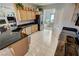 Kitchen with stainless steel appliances and adjacent breakfast nook, perfect for entertaining at 720 Florida St, Pahrump, NV 89048