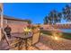 Relaxing backyard with seating area, grill, pool, and landscaped features at 7411 Zonal Ave, Las Vegas, NV 89131