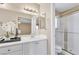 Bathroom featuring a vanity with a sink and a separate shower stall at 7624 Desert Delta Dr, Las Vegas, NV 89128