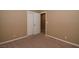 Bedroom featuring a closet with double doors, neutral walls, and carpeted floors at 7624 Desert Delta Dr, Las Vegas, NV 89128