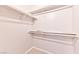 A functional walk-in closet space features built-in shelving and rod supports for efficient storage at 7885 W Flamingo Rd # 1016, Las Vegas, NV 89147