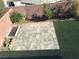 Turf yard with stone patio and block wall, offering a private outdoor space at 8494 Langhorne Creek St, Las Vegas, NV 89139